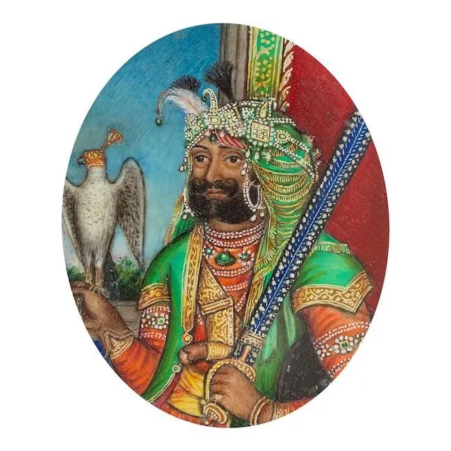 A small painting on ivory depicting Maharajah Sher Singh holding a falcon North India, circa 185...: A small painting on ivory depicting Maharajah Sher Singh holding a falcon North India, circa 1850-55 gouache and gold on ivory, oval, in later circular glazed frame painting 50 x 42 mm.; frame 75 mm. 
