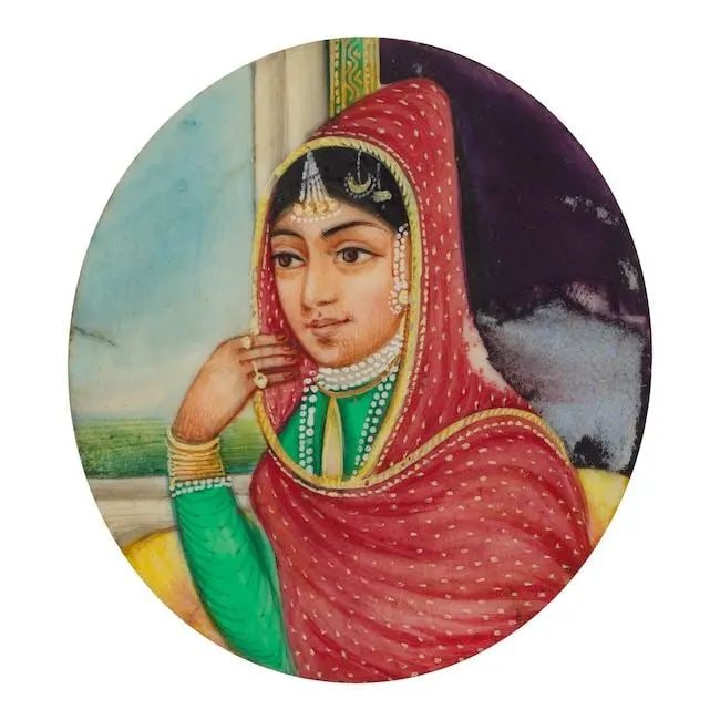 A small painting on ivory depicting Rani Jindan, wife of Maharajah Ranjit Singh North India, cir...: A small painting on ivory depicting Rani Jindan, wife of Maharajah Ranjit Singh North India, circa 1850-55 gouache and gold on ivory, attached to a square of watermarked paper, inscribed recto and ver