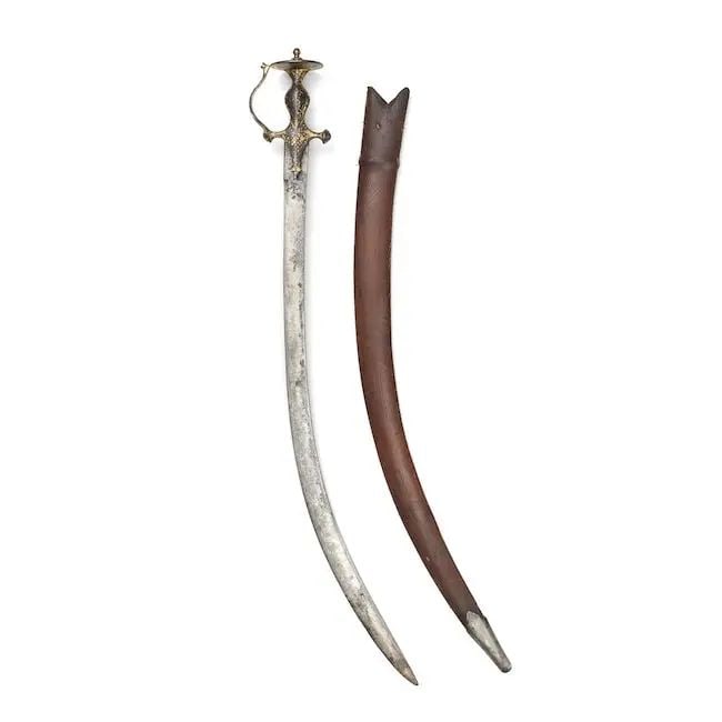 A gold koftgari-hilted steel sword (tulwar) with inscription Punjab, 19th Century (1 of 1)