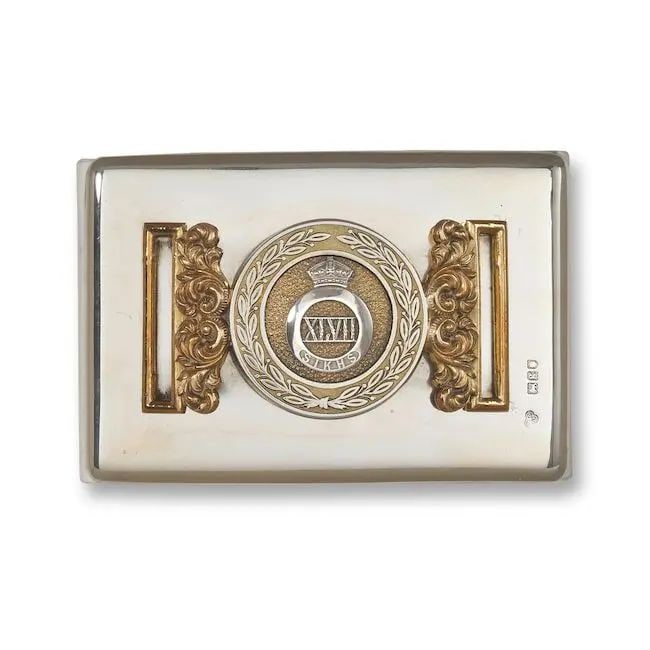 A silver-gilt waistbelt clasp of the 47th Sikhs mounted as an ink blotter India and London, the ...: A silver-gilt waistbelt clasp of the 47th Sikhs mounted as an ink blotter India and London, the blotter dated 1902 the silver buckle of typical form with regimental number, 'XLVII', to centre within q