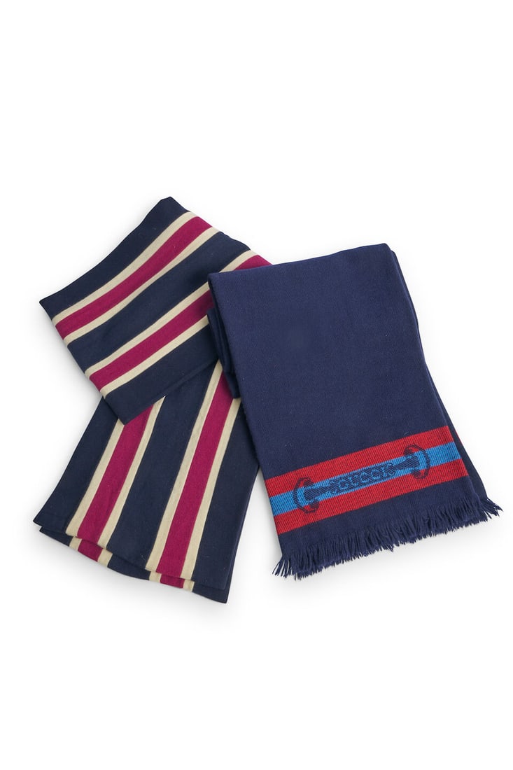 Gucci | wool-cashmere scarf and Oxford scarf by Shepherd and Woodward: Gucci | wool-cashmere scarf and Oxford scarf by Shepherd and Woodward the Gucci scarf in navy blue with borders of red and pale blue with woven horse-bit insignia, together with a pure wool striped sc