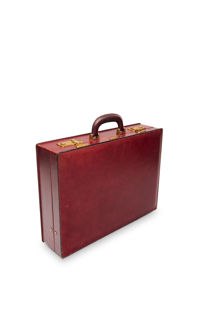 Bottega Veneta | vintage burgundy briefcase labelled 'Bottega Veneta made in Italy' to plaque in...: Bottega Veneta | vintage burgundy briefcase labelled 'Bottega Veneta made in Italy' to plaque internally, with combination lock closures, internal compendium divider, faun leather interior, accompanie