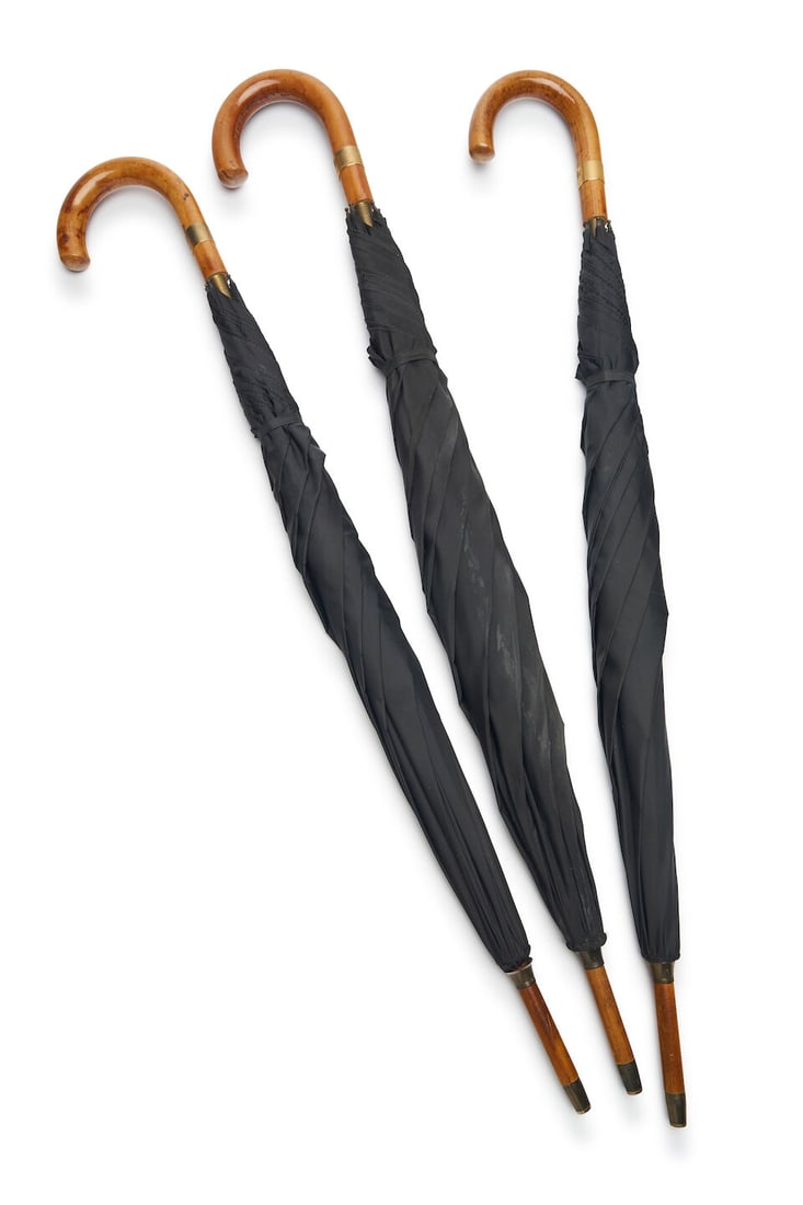 Swaine Adeney Brigg & Sons | three umbrellas each with timber handle and black fabric (1 of 2)