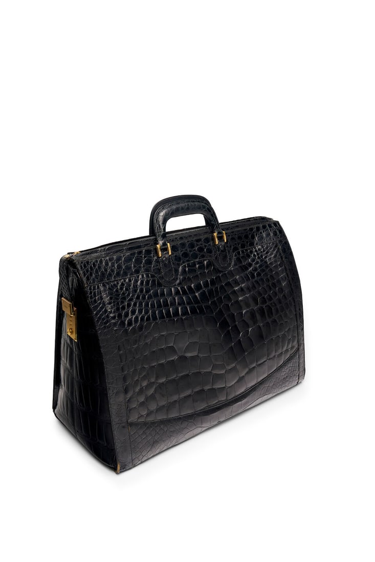 Fendi | black crocodile overnight tote: Fendi | black crocodile overnight tote with combination lock closure, fair condition, height 36.5cm, length 50.0cm, depth 24.0cm For further information on this lot please visit Bonhams.com For furthe
