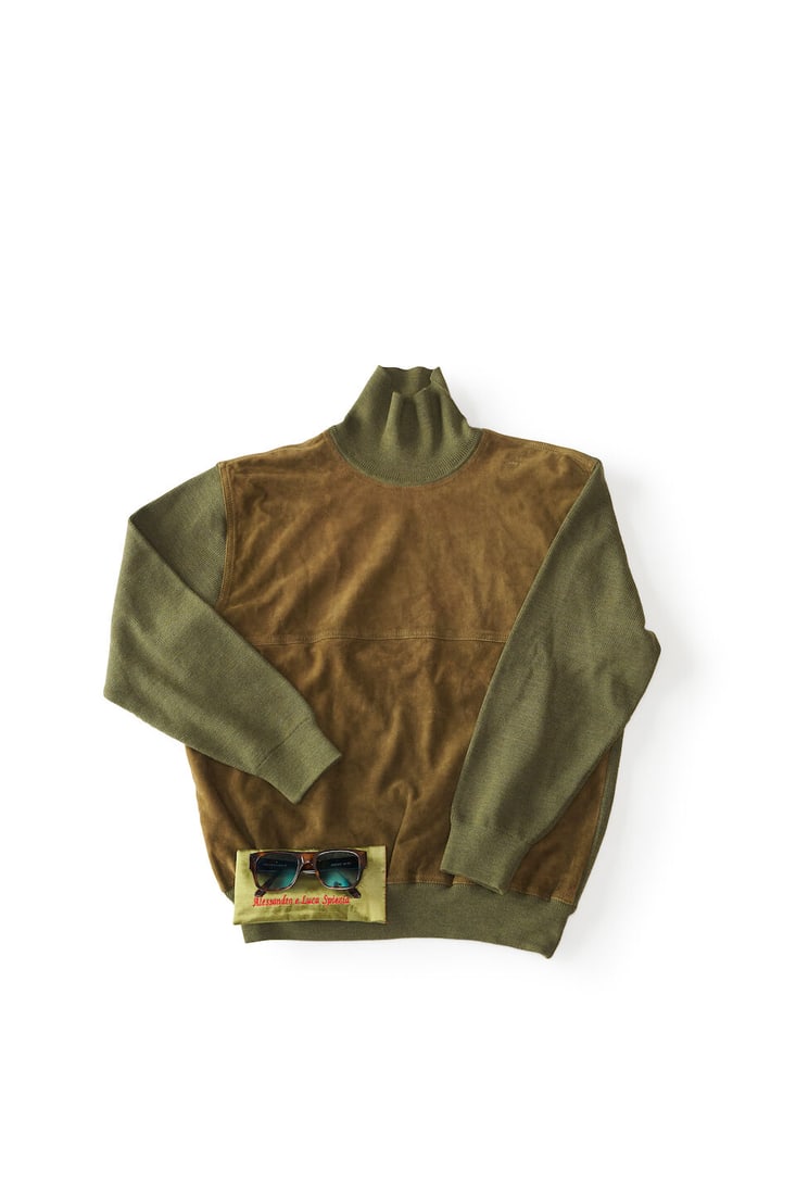 Christian Dior | a green jerkin sweater size XL: Christian Dior | a green jerkin sweater size XL half calfskin, half virgin wool in good condition, with marks to the right shoulder, together with a pair of brown Spiezia sunglasses in embroidered gre