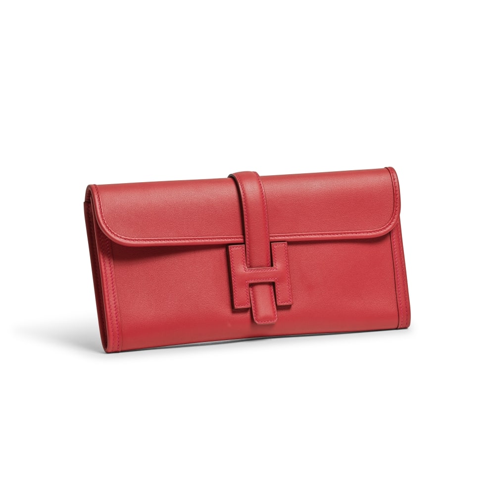 Hermès Paris, année 2015. Pochette Jige Elan en veau Swift Rouge Coeur Hermès Par...: Hermès Paris, année 2015. Pochette Jige Elan en veau Swift Rouge Coeur Hermès Paris, 2015. Jige Elan pouch in Heart Red Swift calfskin. Condition grade: A +. 29 x 14 x 2 cm. Footnotes: 