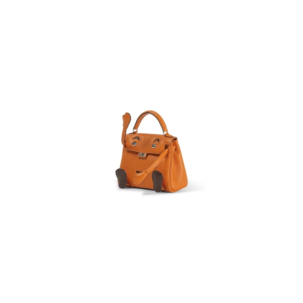 Hermès Paris, année 2009. Kelly Doll Quelle Idole en veau Swift orange H et chocolat. ...: Hermès Paris, année 2009. Kelly Doll Quelle Idole en veau Swift orange H et chocolat. Hermès Paris, year 2009. Kelly Doll Quelle Idole in orange H and chocolate Swift calfskin. Garnitur