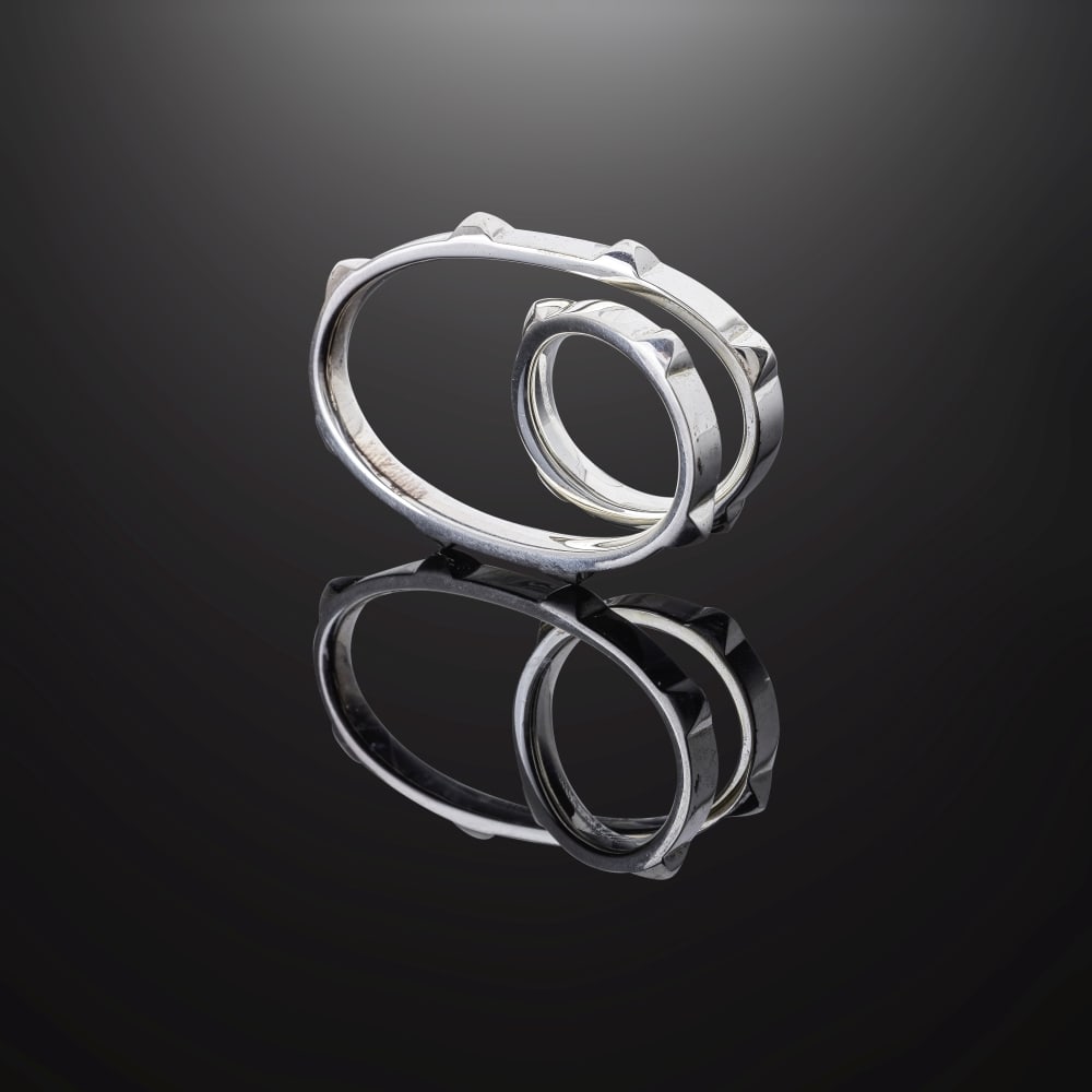 Hermès Paris. Bague double Clou d'H en argent 925 °/°°. Hermès Paris. D...: Hermès Paris. Bague double Clou d'H en argent 925 °/°°. Hermès Paris. Double Clou d'H ring in 925 silver. Taille indiquée/ Size indicated: 52. Poids/Weight total: 13,47 g