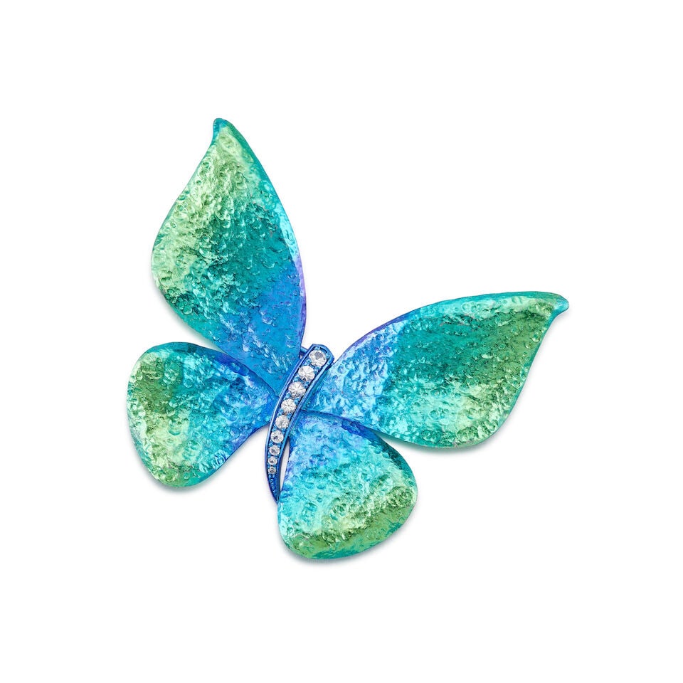 TITANIUM AND DIAMOND 'BUTTERFLY' BROOCH: TITANIUM AND DIAMOND 'BUTTERFLY' BROOCH 鈦金屬配鑽石「蝴蝶」別針 Metal: titanium Dimensions: 5.1 x 4.7cm Gross weight: