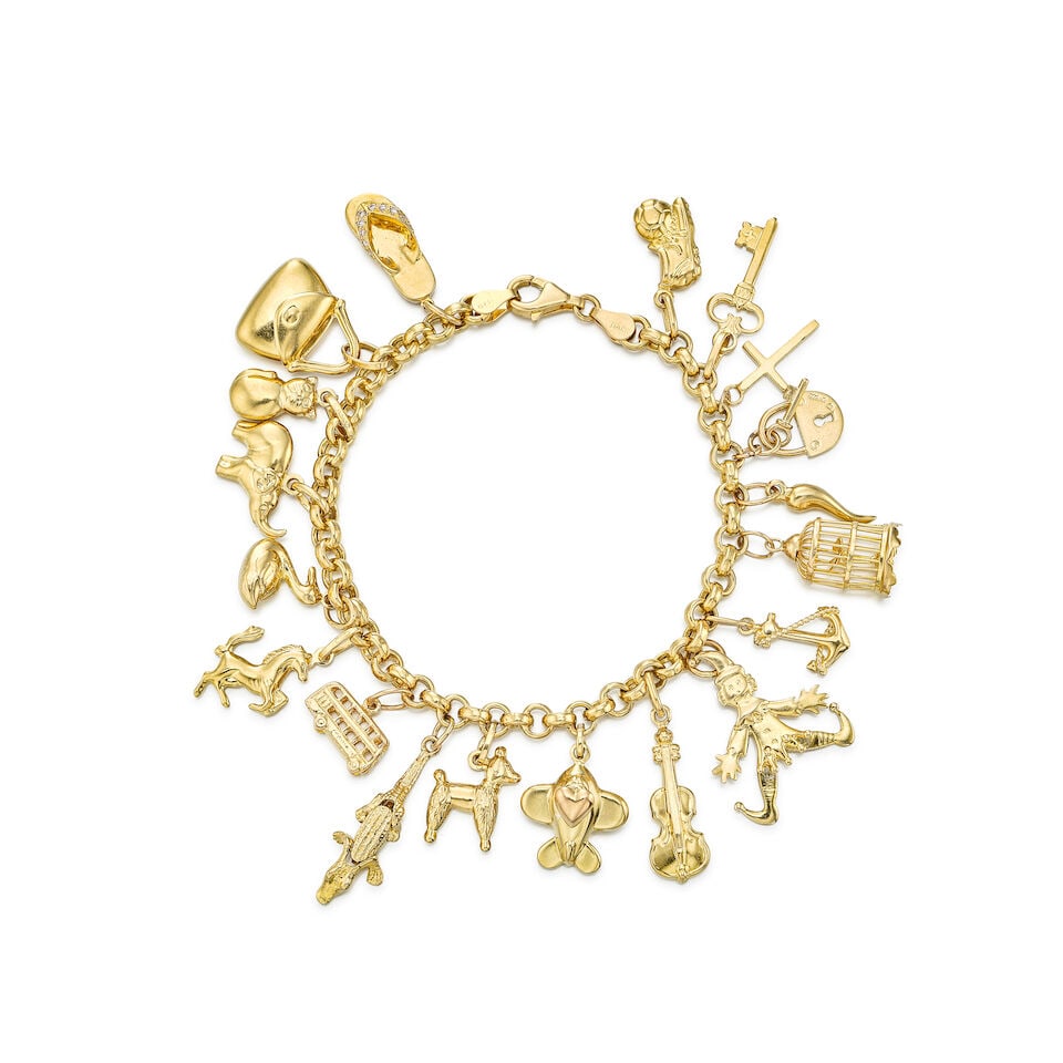 GOLD CHARM BRACELET: GOLD CHARM BRACELET 黃金串飾手鍊 Metal: 18 and 14 karat yellow gold Length: 17.5cm Gross weight: 29.6g For further information on this lot please visit