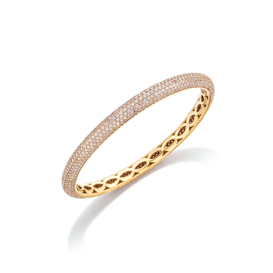 COLOURED DIAMOND BANGLE: COLOURED DIAMOND BANGLE 彩色鑽石手鐲 Coloured diamonds: approx. 15.50cts Metal: 18 karat pink gold Inner circumference: 19.5cm Gross weight: 28.8g Footnotes: Colour