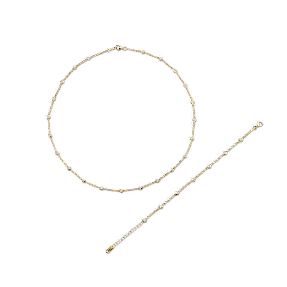 DIAMOND NECKLACE AND BRACELET SET (2): DIAMOND NECKLACE AND BRACELET SET 鑽石項鍊及手鍊套裝 Diamonds: stamped 1.16cts total Metal: 18 karat yellow gold Length: necklace 40.5cm;