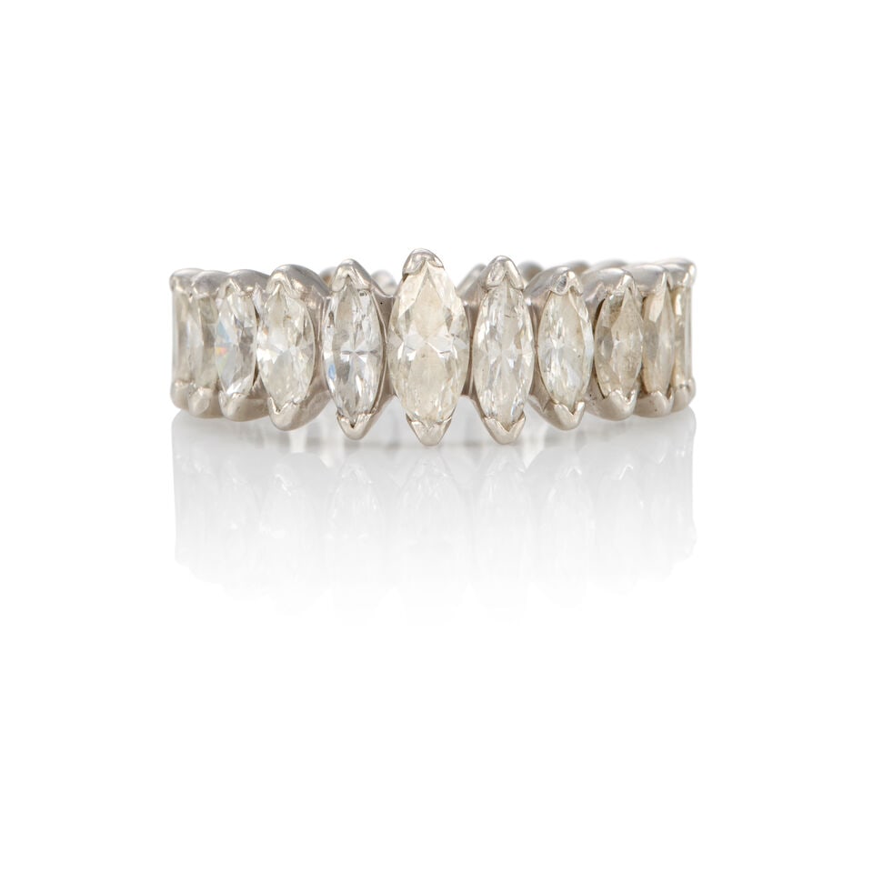 PLATINUM AND DIAMOND RING: PLATINUM AND DIAMOND RING • Platinum • Numerous marquise-shaped diamonds weighing approximately 2.60 - 2.75 carats total • Size 6 • Estimated gross weight: 8.1