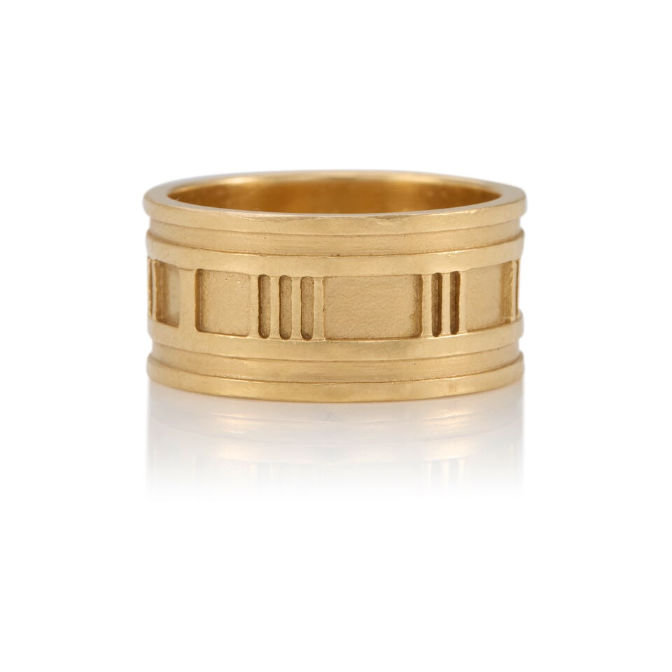 TIFFANY & CO.: 18K GOLD 'ATLAS' RING: TIFFANY & CO.: 18K GOLD 'ATLAS' RING • 18k yellow gold • Signed TIFFANY & CO., 1995 • Size 10 1/2 • Estimated gross weight: 14.0 grams Footnotes: Overall condition, very