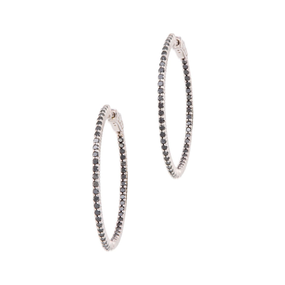 PAIR OF 14K GOLD AND BLACK DIAMOND HOOP EARRINGS: PAIR OF 14K GOLD AND BLACK DIAMOND HOOP EARRINGS • 14k white gold • Numerous round black diamonds weighing approximately 0.90- 1.10 carat total • Measures 1 1/2 x 1 9/16 in. •