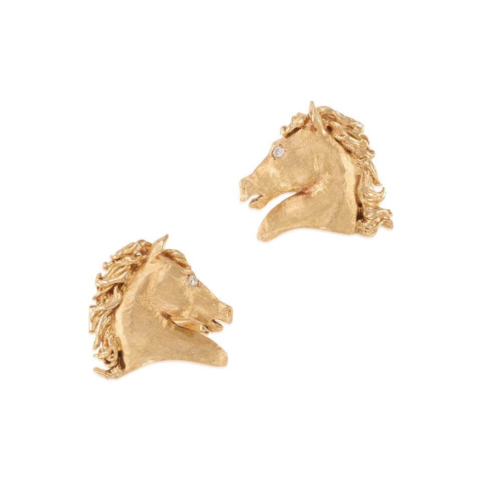 PAIR OF 14K GOLD AND DIAMOND CUFFLINKS: PAIR OF 14K GOLD AND DIAMOND CUFFLINKS • 14k white gold • 2 round diamonds weighing approximately 0.05 - 0.15 carat total • Measures 7/8 in. x 7/8 in. • Estimated gross