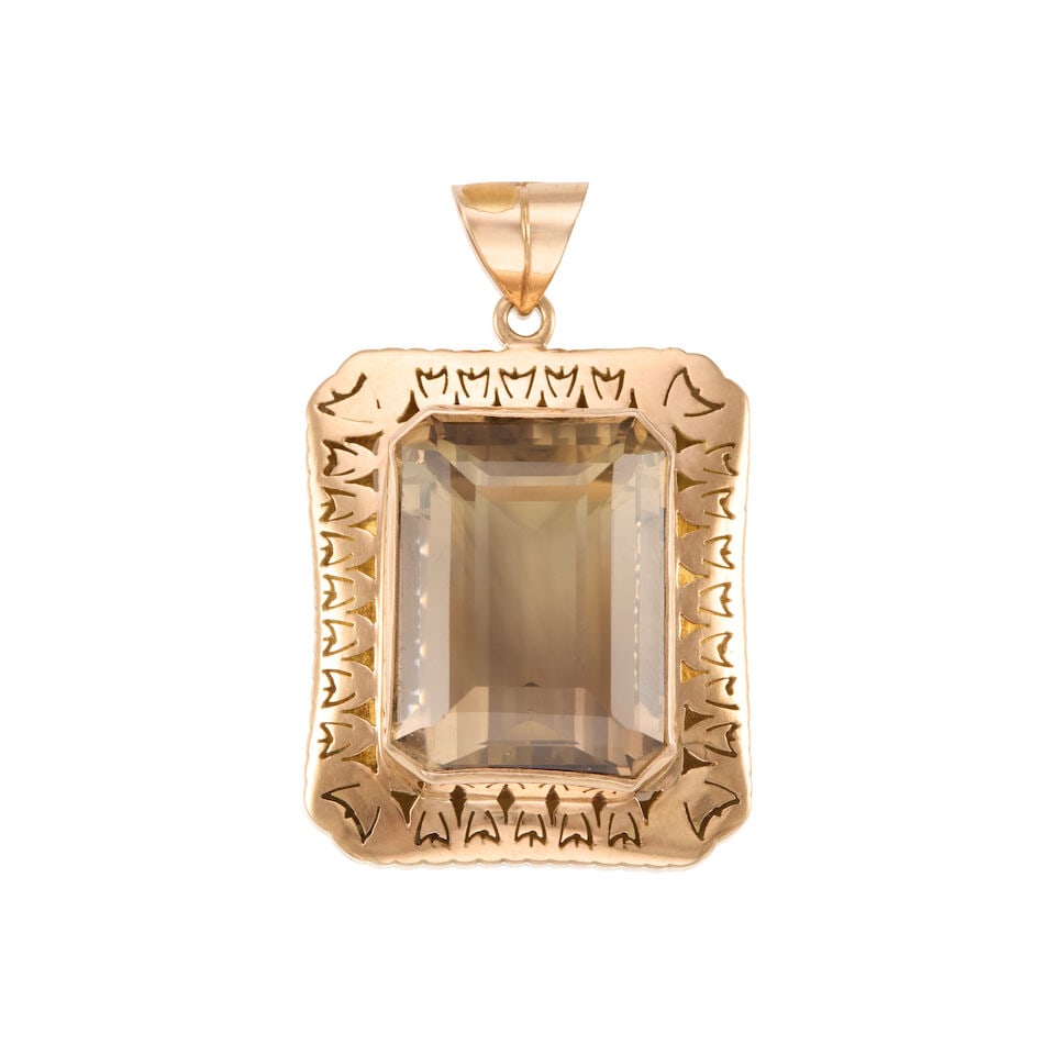 GOLD AND SMOKY QUARTZ PENDANT: GOLD AND SMOKY QUARTZ PENDANT • 13k rose gold • 1 rectangular smokey quartz weighing approximately 46.50 - 46.80 carats • Measures 2 in. x 1 1/4 in. • Estimated gross weight: