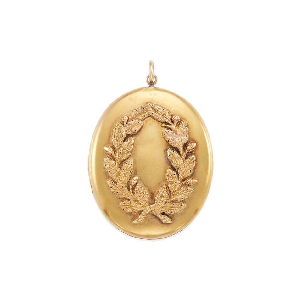VICTORIAN GOLD LOCKET PENDANT: VICTORIAN GOLD LOCKET PENDANT • 14k yellow gold, bloomed front side • Inner glass replaced with plastic • Dimensions 1 1/2 x 1 1/4 in. • Estimated gross weight: 14.5