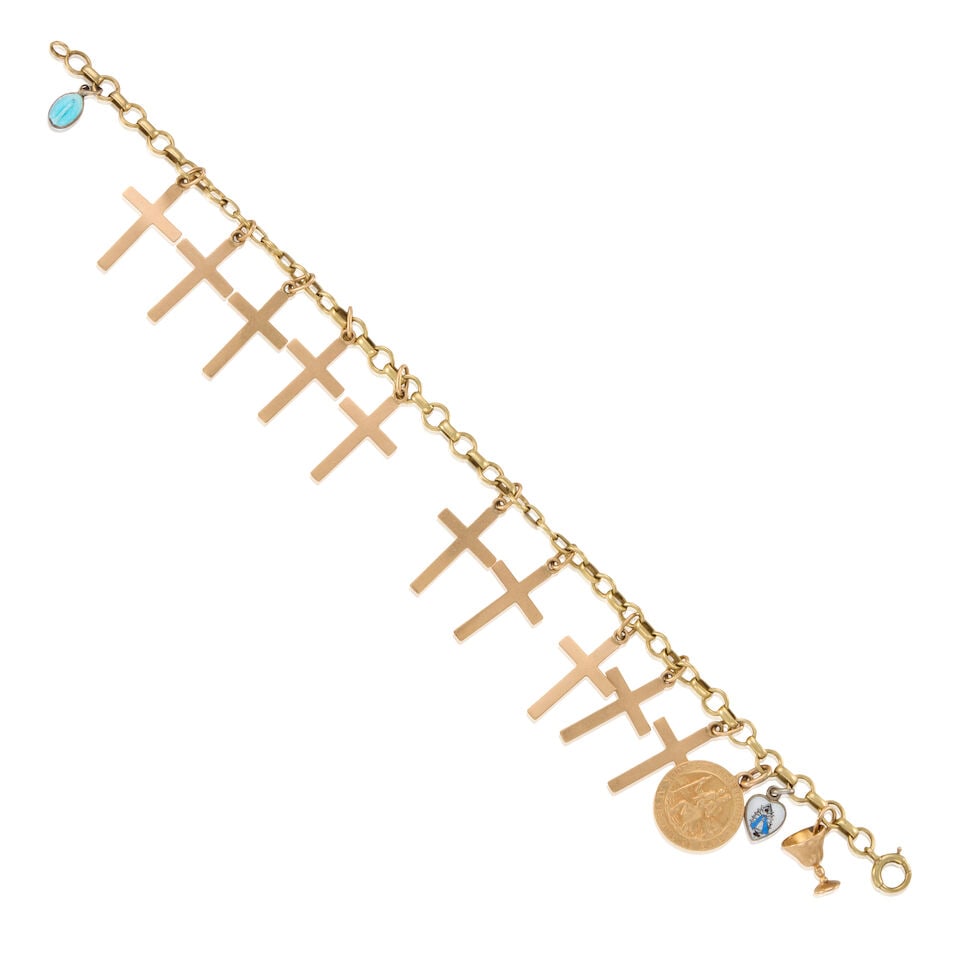 CHARM BRACELET: CHARM BRACELET • 14k yellow gold chain bracelet • 11 charms of 14k yellow gold • 2 charms of base metal and enamel • 1 charm of 10k yellow gold • Length 7 1/4 in.