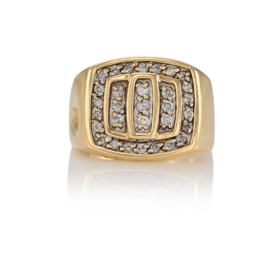 10K GOLD AND DIAMOND RING: 10K GOLD AND DIAMOND RING • 10k yellow gold • Numerous round diamonds weighing approximately 0.45 - 0.55 carat total • Maker's mark • Size 7 3/4 • Estimated gross