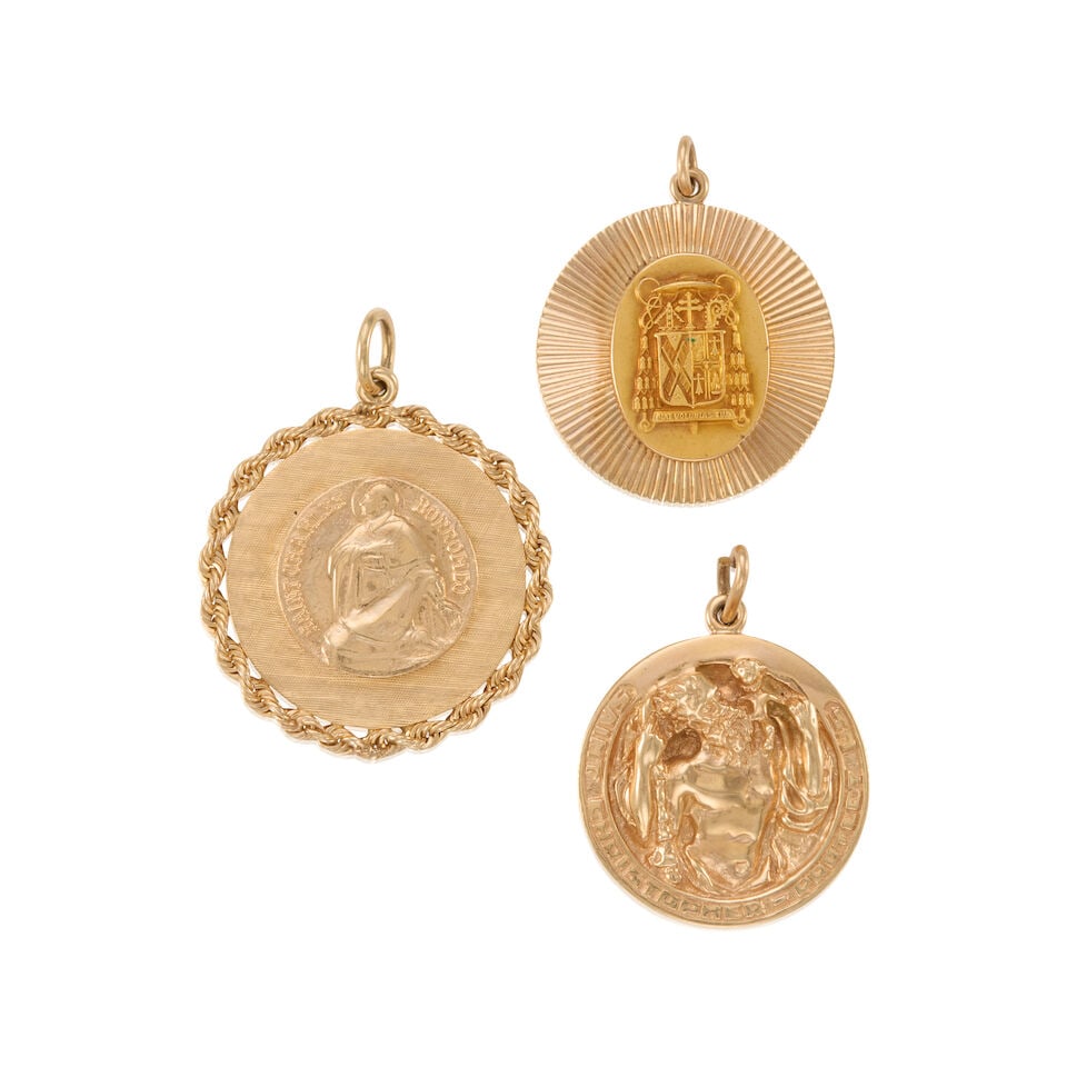 GROUP OF 14K GOLD CHARM/PENDANTS: GROUP OF 14K GOLD CHARM/PENDANTS • 14k yellow gold • Large personal inscriptions on back of two of the pendants • Measures 1 x 1 in., 1 x 1 in. 1 3/16 x 1 3/16 in. • Estimated 