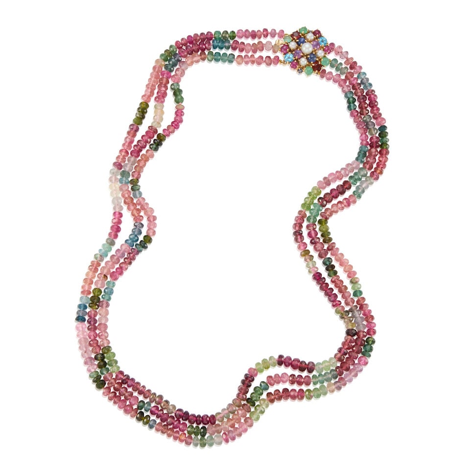 14K GOLD AND TOURMALINE NECKLACE: 14K GOLD AND TOURMALINE NECKLACE • 14k yellow gold • 3 strands of varying colored faceted tourmaline beads measuring approximately 5.20 - 5.35 mm • Gem-set clasp • Length 22 in