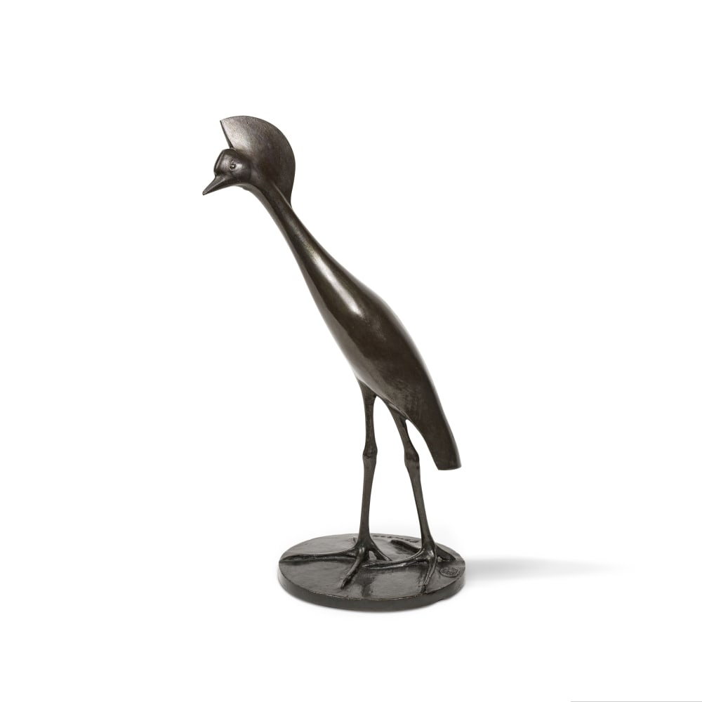 FRANÇOIS POMPON (1855-1933) Grue couronnée en marche: FRANÇOIS POMPON (1855-1933) Grue couronnée en marche signé 'Pompon' et porte le cachet du fondeur 'C. Valsuani cire perdue' (sur la terrasse) bronze à patine noire nuancée de 