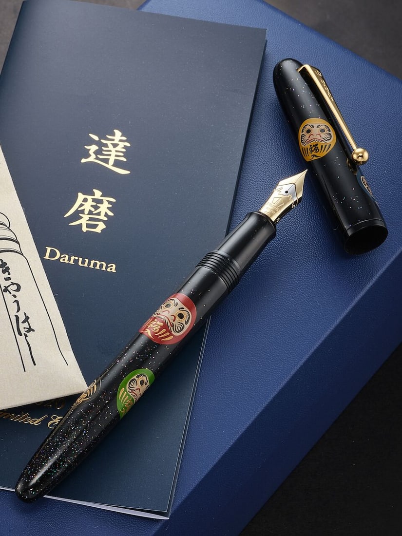 [NO RESERVE] NAMIKI | YUKARI 'DARUMA', A LIMITED EDITION TOGIDASHI-HIRA MAKI-E AND LACQUER FOUNT...: [NO RESERVE] NAMIKI | YUKARI 'DARUMA', A LIMITED EDITION TOGIDASHI-HIRA MAKI-E AND LACQUER FOUNTAIN PEN, BY KOKKOKAI COLLECTIVE, CIRCA 2020 Model: Yukari 'Daruma', Limited No. 229/500 Cap/Barrel/Clip: