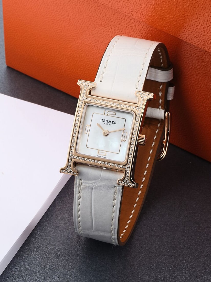 [NO RESERVE] HERMÈS | HEURE H, REF.HH1.273C, A PINK GOLD AND DIAMOND-SET WRISTWATCH WITH MO...: [NO RESERVE] HERMÈS | HEURE H, REF.HH1.273C, A PINK GOLD AND DIAMOND-SET WRISTWATCH WITH MOTHER-OF-PEARL DIAL, CIRCA 2023 Case No: 3706923 Calibre: Quartz, signed Dial: Mother-of-pearl, signed Ca