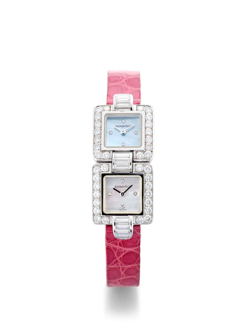 AUDEMARS PIGUET | A RARE AND ELEGANT WHITE GOLD AND DIAMOND-SET DUAL TIME WRISTWATCH WITH BLUE A...: AUDEMARS PIGUET | A RARE AND ELEGANT WHITE GOLD AND DIAMOND-SET DUAL TIME WRISTWATCH WITH BLUE AND WHITE MOTHER-OF-PEARL DIALS, CIRCA 1980 Case No: D94649, D9461 Calibre: 2601, quartz, signed Dial: Bl