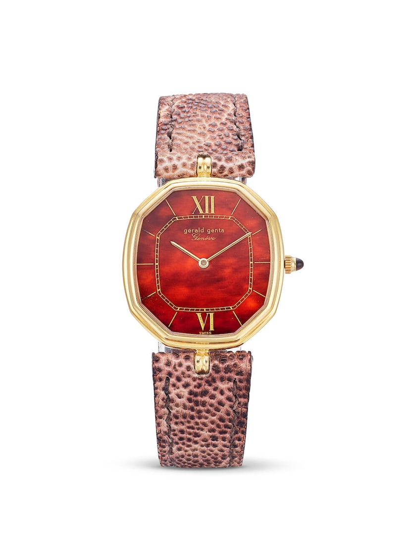GÉRALD GENTA | REF.G 1911.7, A YELLOW GOLD WRISTWATCH WITH TORTOISE ACETATE DIAL, CIRCA 1980 (1 of 3)