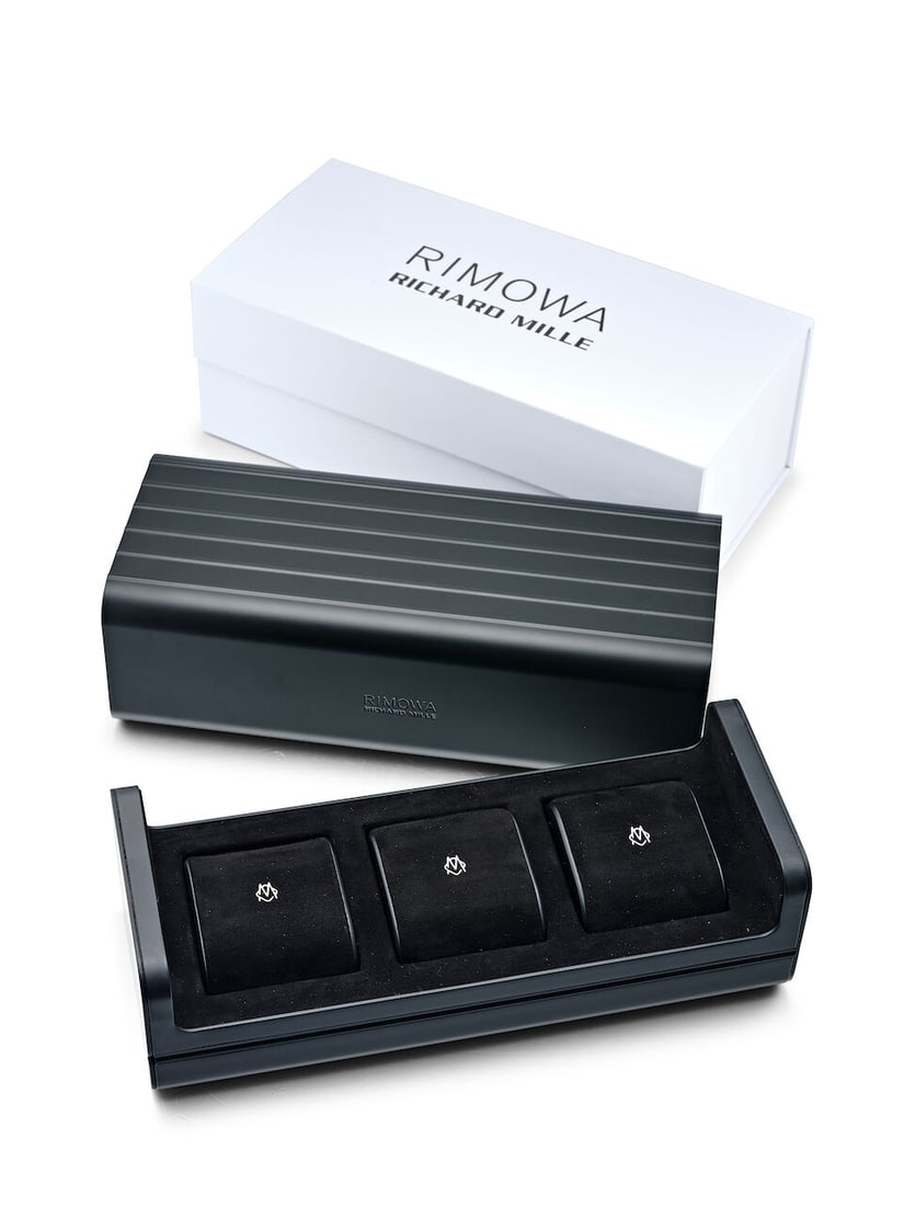 [NO RESERVE] RIMOWA X RICHARD MILLE | AN ALUMINIUM WATCH TRAVEL CASE, CIRCA 2023: [NO RESERVE] RIMOWA X RICHARD MILLE | AN ALUMINIUM WATCH TRAVEL CASE, CIRCA 2023 Material: Black anodized aluminium Measurement: 27cm (L) x 11cm (W) x 8.5cm (H) Accompaniments: Maker's instruction
