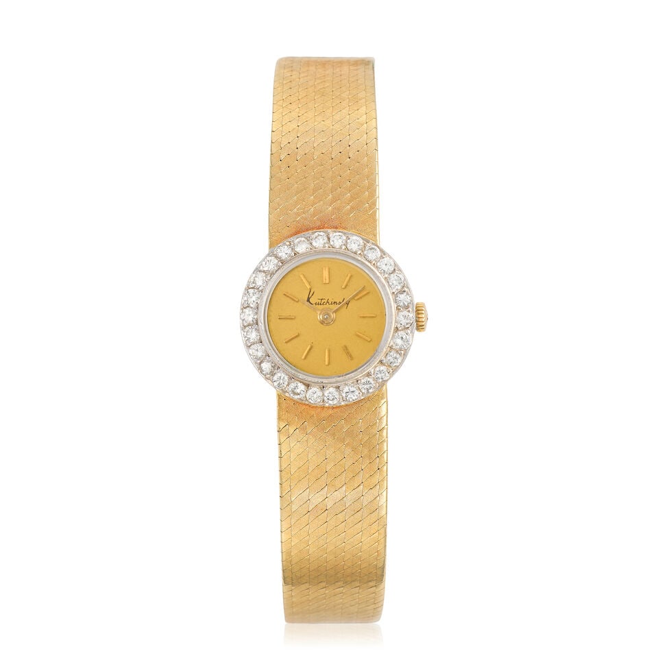 Chopard for Kutchinsky. A lady's 18K gold and diamond set manual wind bracelet watch London Impo...: Chopard for Kutchinsky. A lady's 18K gold and diamond set manual wind bracelet watch Date: London Import mark for 1989 Movement: 17-jewel manual wind Dial: Champagne Case: Polished round, diamond set 