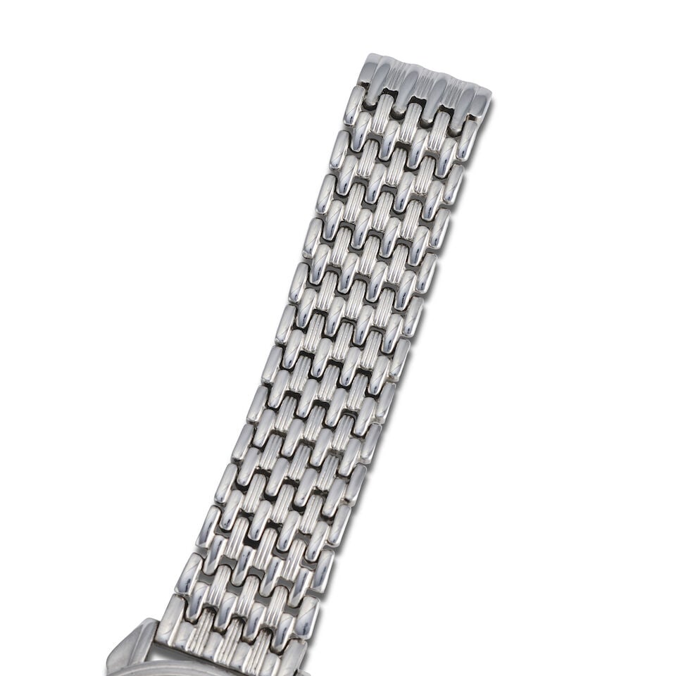 Movado. A stainless steel manual wind triple calendar bracelet watch with moon phase Circa 1940 - 2