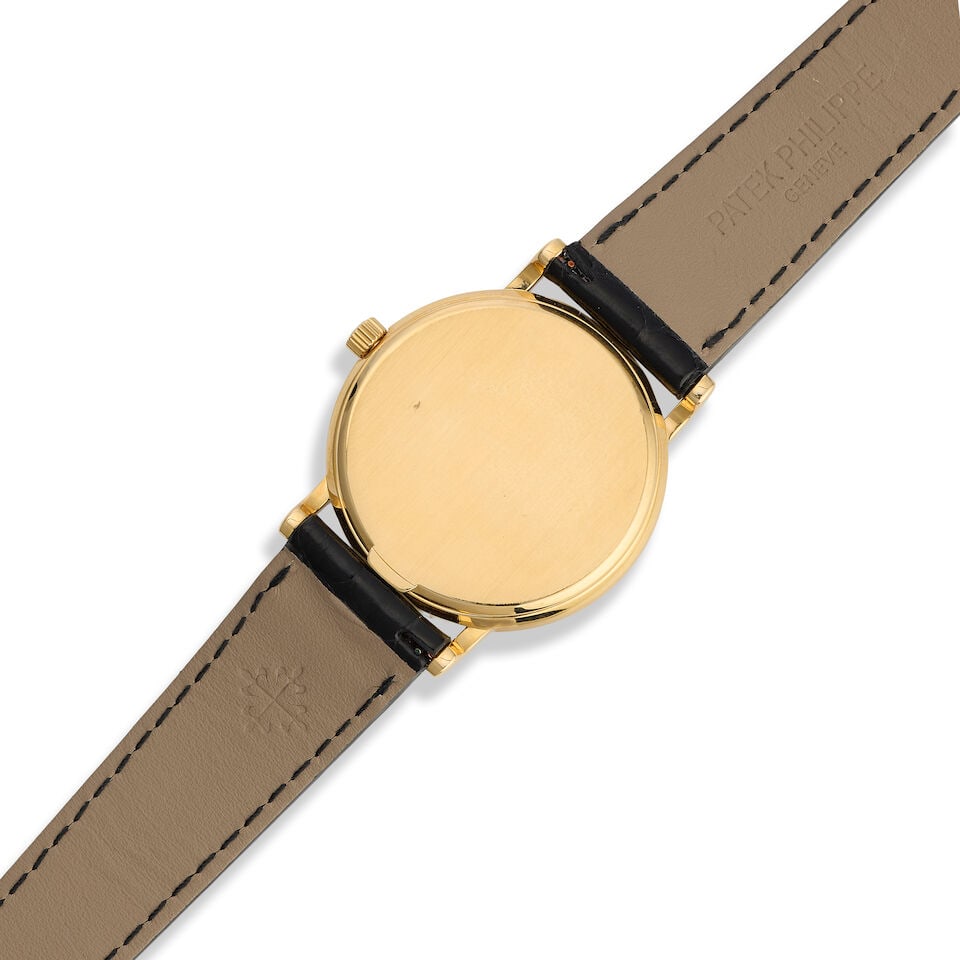 Patek Philippe. An 18K gold automatic calendar wristwatch Calatrava, Ref: 3802/200, Circa 1999 - 3