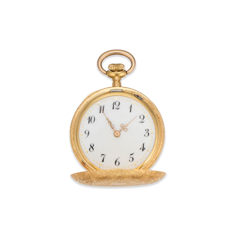An 18K gold keyless wind full hunter pocket watch with continental gold chain Circa 1900 - 5