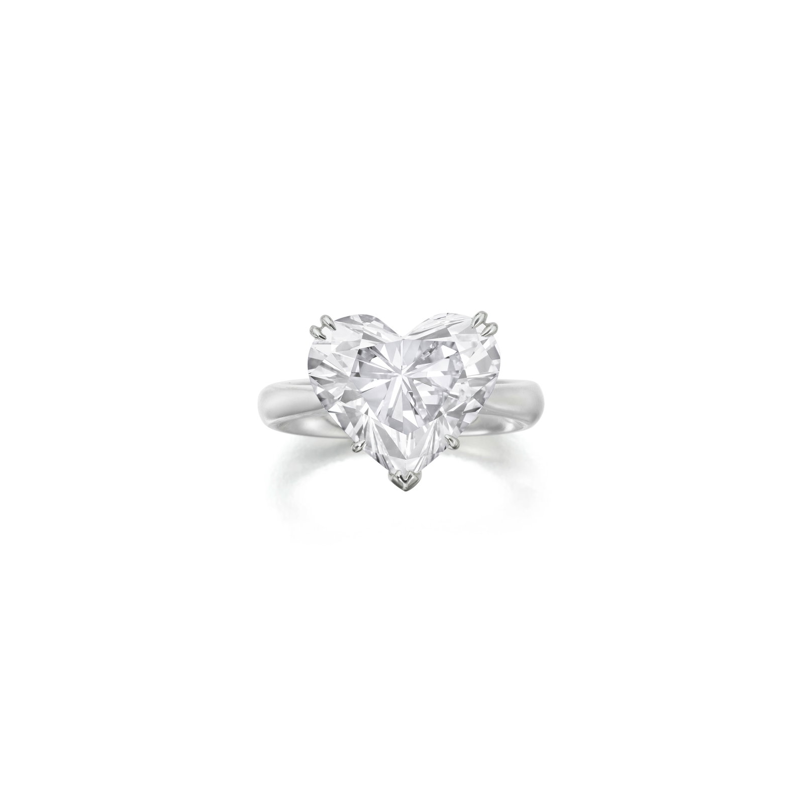 A DIAMOND RING: A DIAMOND RING Centering a heart-shaped diamond, weighing 5.55 carats; mounted in platinum; size 4½ Footnotes: Accompanied by GIA report stating that the diamond is E color with VVS2 clarity.