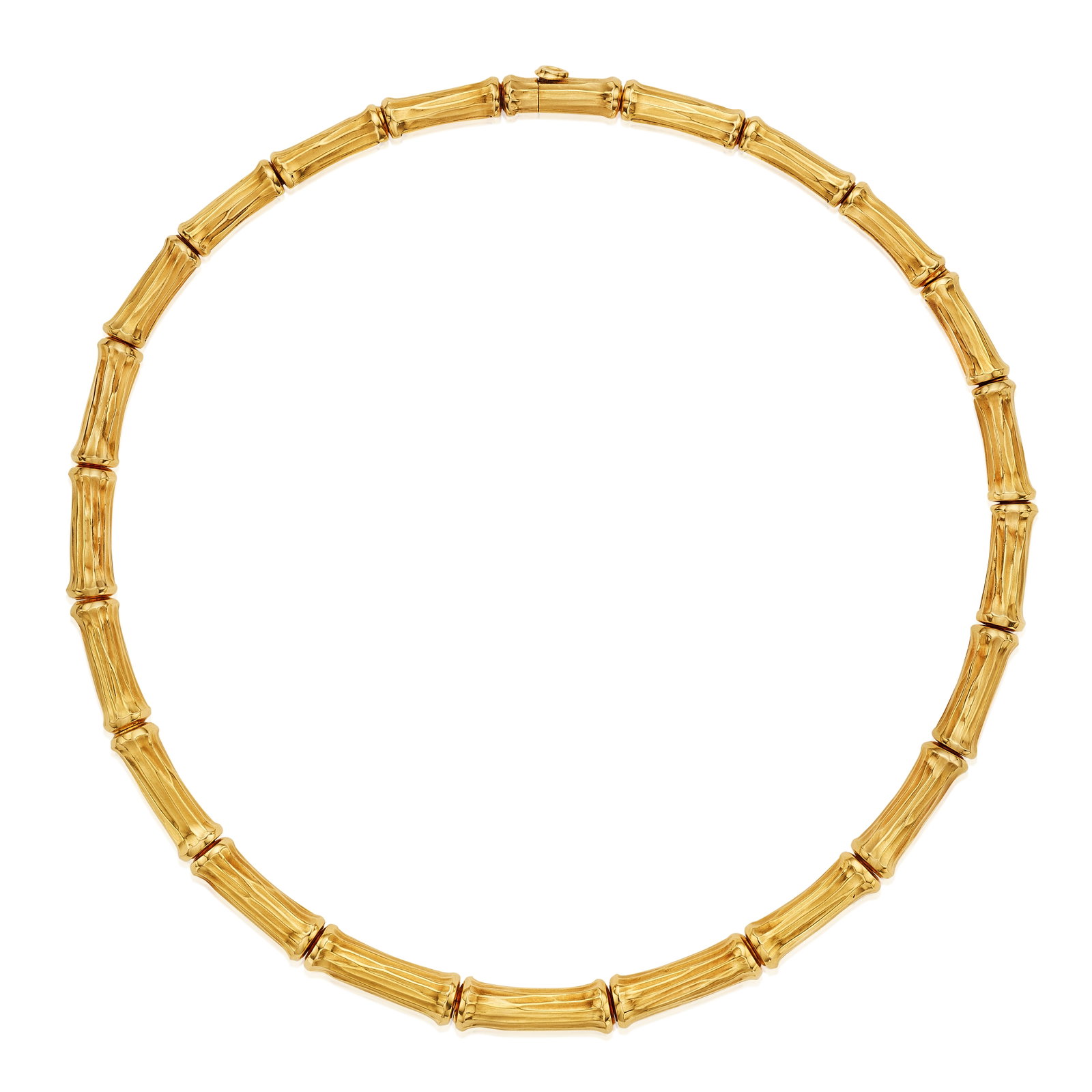 CARTIER: AN 18K GOLD NECKLACE, FRANCE, 1970: CARTIER: AN 18K GOLD NECKLACE, FRANCE, 1970 Designed as a flexible collar with a repeating bamboo motif; signed Cartier, no. 694748; with maker's mark and French assay mark; gross approximate weight