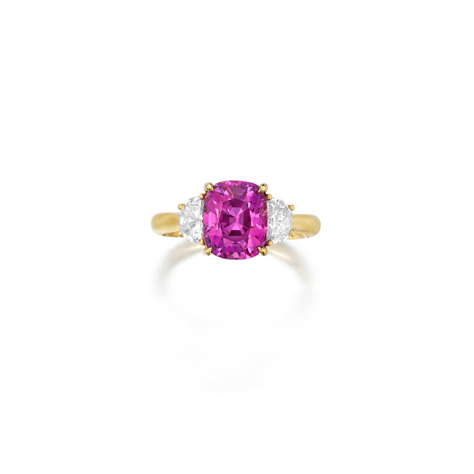 A PINK SAPPHIRE AND DIAMOND RING: A PINK SAPPHIRE AND DIAMOND RING Centering a cushion-cut pink sapphire, weighing 4.04 carats, flanked by two half moon-shaped diamonds; mounted in 18K gold; size 5¼ Footnotes: Accompanied by AGL 