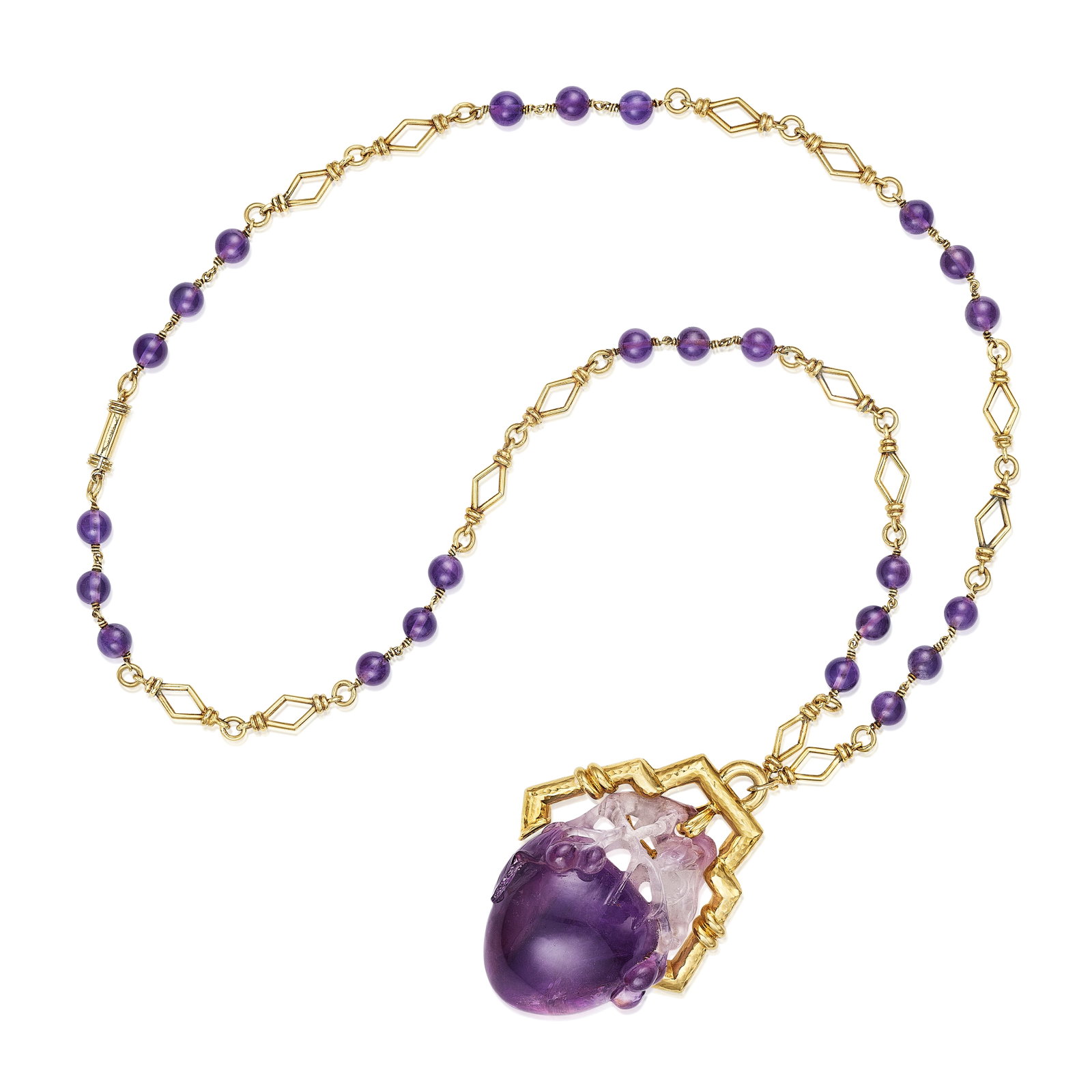 DAVID WEBB: AN AMETHYST NECKLACE: DAVID WEBB: AN AMETHYST NECKLACE Centering a carved amethyst pendant, to a geometric link chain accented by round amethyst beads; signed WEBB; mounted in 18K gold; pendant length 2½ in; length