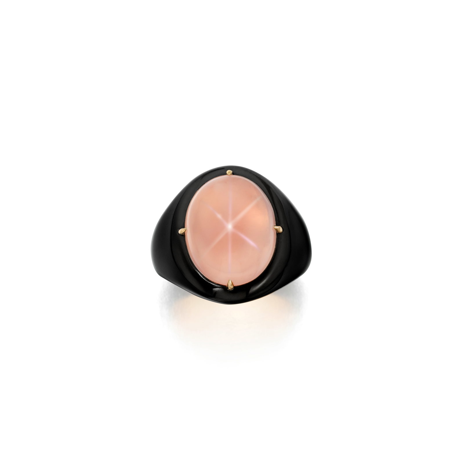 TAFFIN: A ROSE QUARTZ AND CERAMIC RING: TAFFIN: A ROSE QUARTZ AND CERAMIC RING Centering an oval-shaped cabochon rose quartz, within a frame of brown ceramic and pink gold; signed TAFFIN, no. TF6260; with maker's mark; mounted in 18K pink