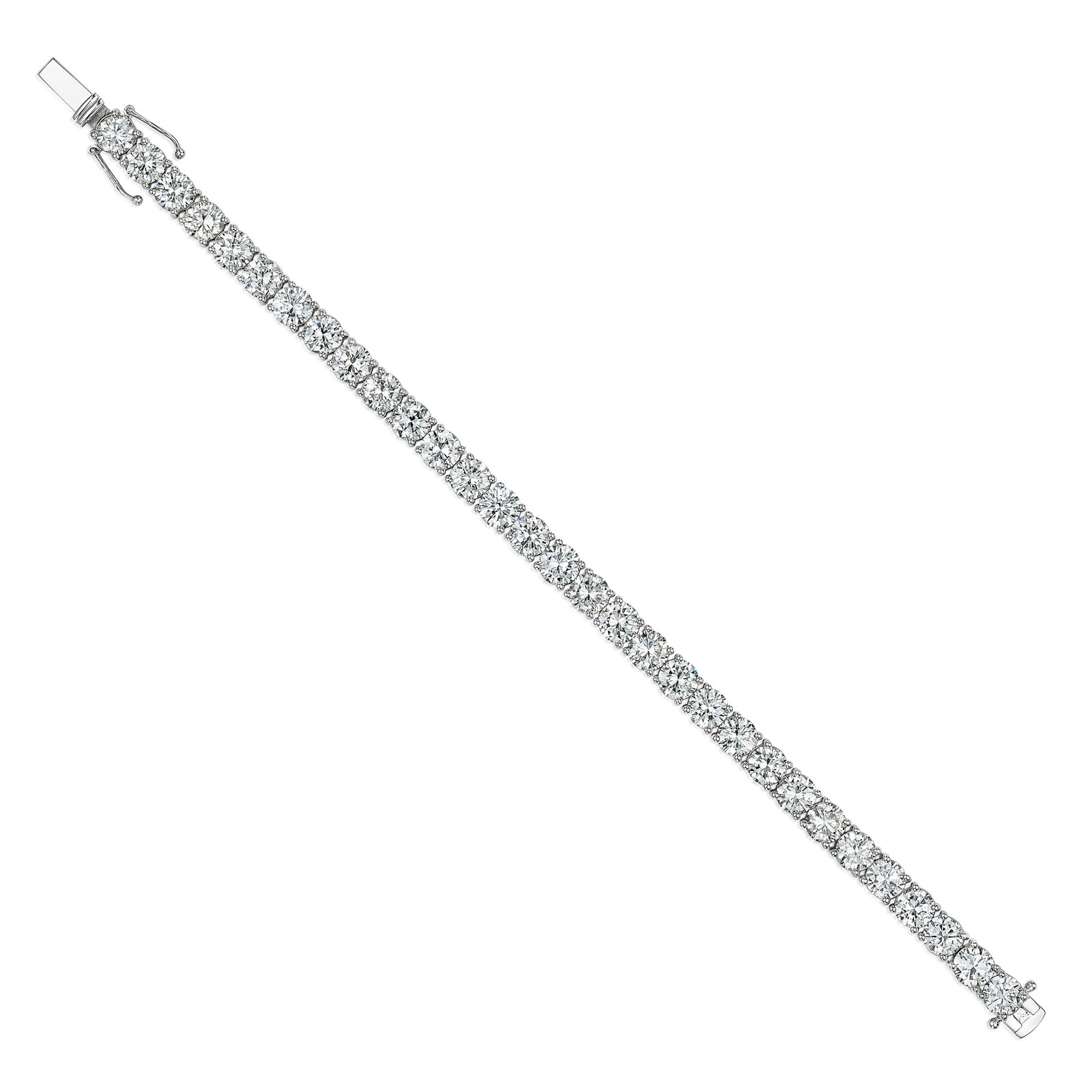 A DIAMOND BRACELET: A DIAMOND BRACELET Designed as a row of round brilliant-cut diamonds; estimated total diamond weight 19.75 carats; mounted in 18K white gold; length 7 in For further information on this lot please