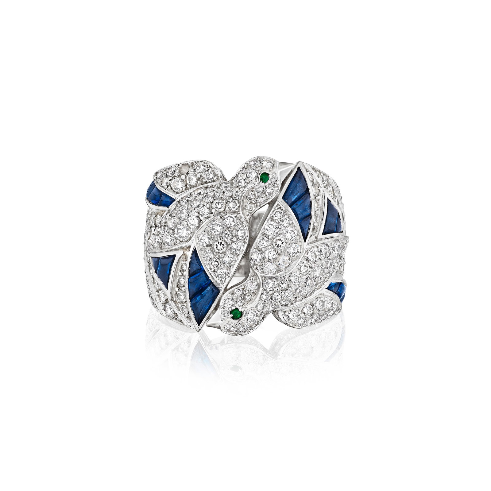CARTIER: A DIAMOND AND SAPPHIRE 'DOVE LES OISEAUX LIBÉRÉS' RING, FRANCE: CARTIER: A DIAMOND AND SAPPHIRE 'DOVE LES OISEAUX LIBÉRÉS' RING, FRANCE Designed as two doves set throughout with round brilliant-cut diamonds and buff-top calibré sapphires; signed