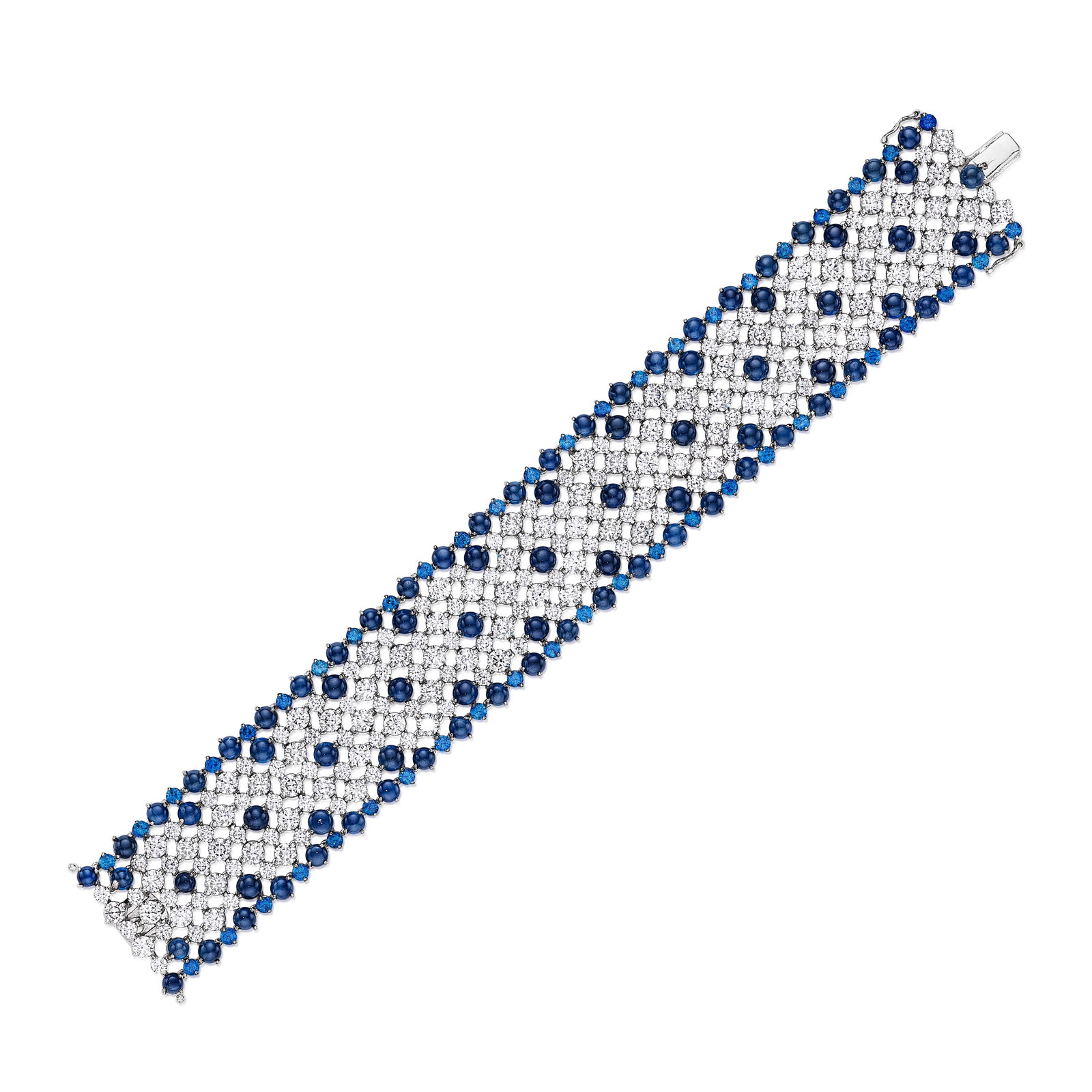 A SAPPHIRE AND DIAMOND BRACELET, ITALY: A SAPPHIRE AND DIAMOND BRACELET, ITALY Of ribbon design, set throughout with round brilliant-cut diamonds interspersing with round and round cabochon sapphires; signed CRIVELLI; with Italian