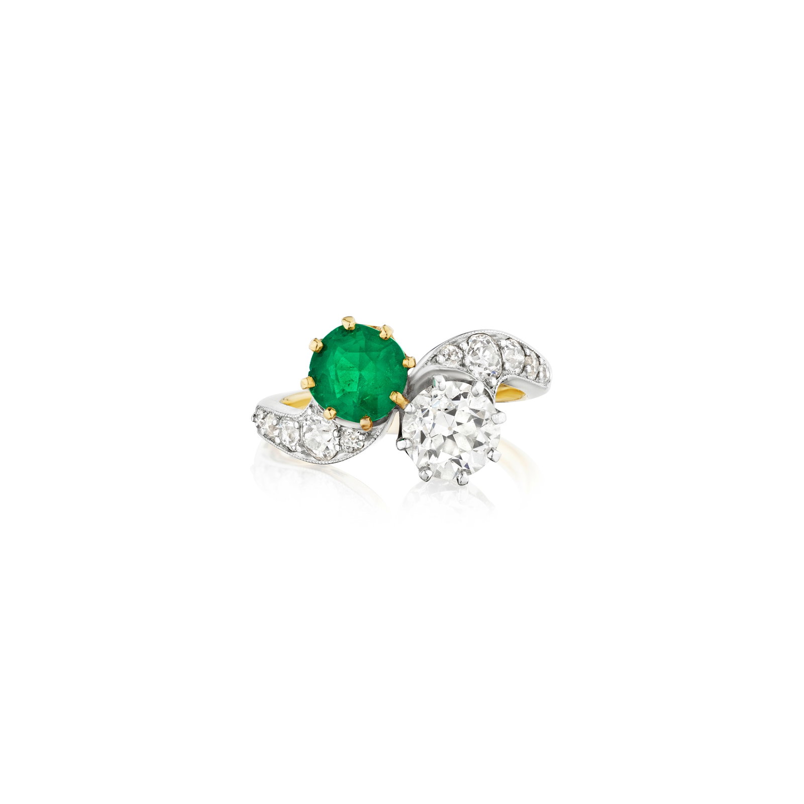 TIFFANY & CO.: AN EMERALD AND DIAMOND RING, CIRCA 1900: TIFFANY & CO.: AN EMERALD AND DIAMOND RING, CIRCA 1900 Of Toi et Moi design, centering a round emerald and an old European-cut diamond, accented by old European and old single-cut diamonds; signed