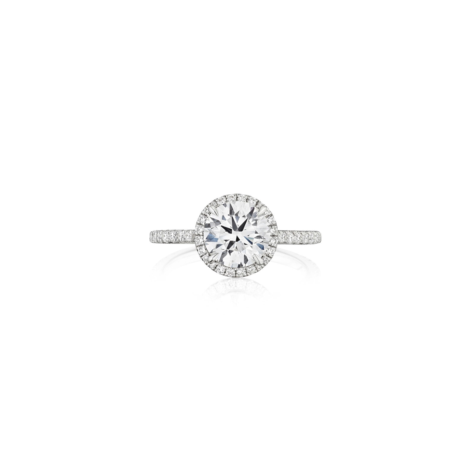 A DIAMOND RING: A DIAMOND RING Centering a round brilliant-cut diamond, weighing 1.15 carats, within a round brilliant-cut diamond-set mount; mounted in platinum; size 3½ Footnotes: Accompanied by GIA report sta