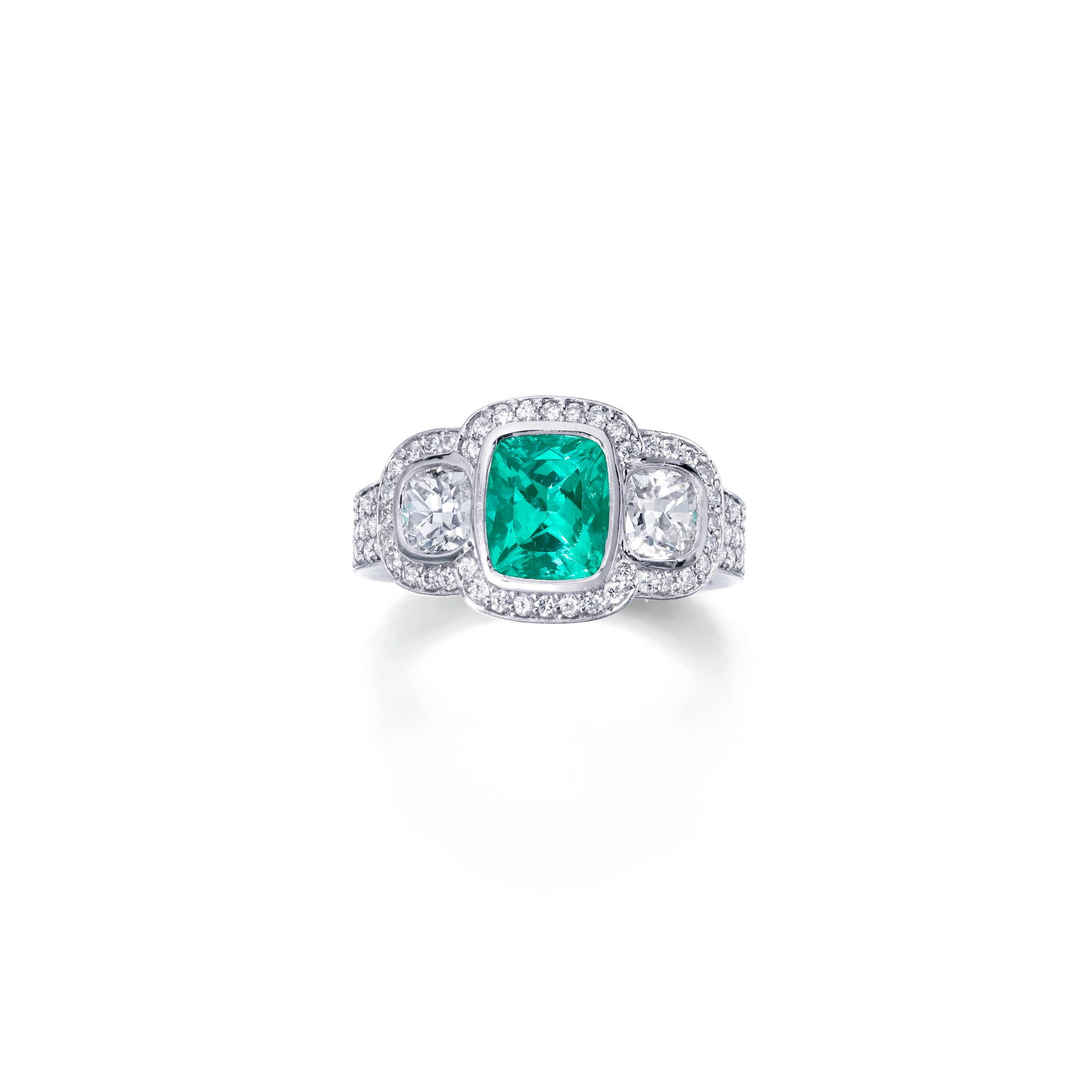 A PARAÍBA TOURMALINE AND DIAMOND RING: A PARAÍBA TOURMALINE AND DIAMOND RING Centering a cushion-cut Paraíba tourmaline flanked by two cushion-cut diamonds, enhanced by round brilliant-cut diamonds; estimated tourmaline weight 1.