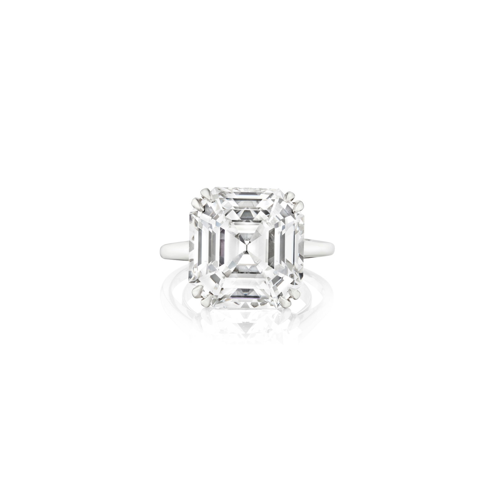 A DIAMOND RING: A DIAMOND RING Centering an emerald-cut diamond, weighing 11.20 carats; mounted in platinum; size 4 to 6½ with sizer Footnotes: Accompanied by GIA report stating that the diamond is E color with 