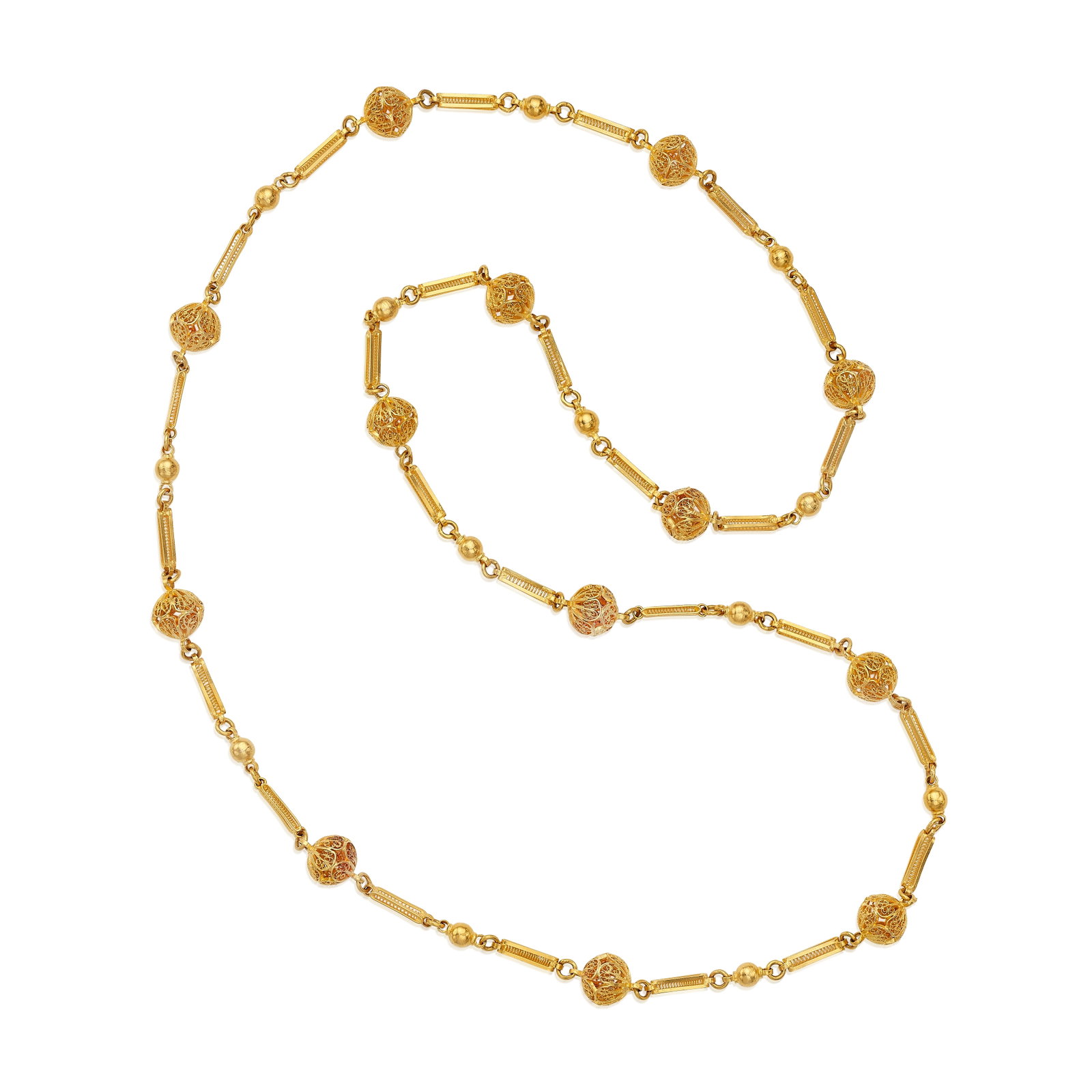 A GOLD NECKLACE: A GOLD NECKLACE Composed of alternating filigree beads and bars; mounted in 20K - 22K gold; gross approximate weight 65.3 g; 33½ in For further information on this lot please visit Bonhams.com