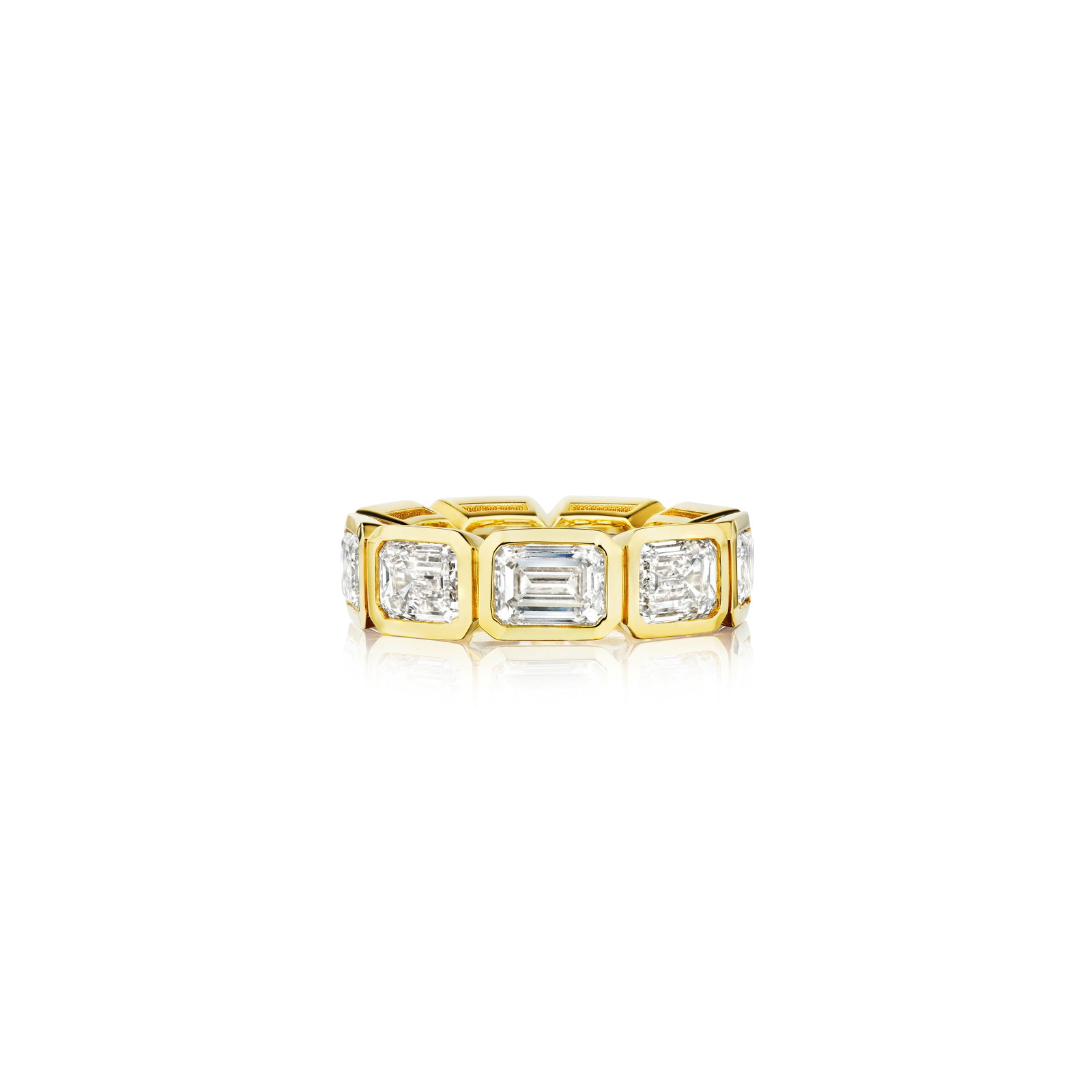 A DIAMOND BAND: A DIAMOND BAND Designed as a row of emerald-cut diamonds, weighing 9.03 carats total; mounted in 18K gold; size 6¼ Footnotes: Accompanied by nine GIA reports stating that the diamonds are I-J